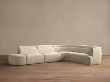 Cream Lovina Five-Piece Sectional: ottoman, 2 armless chairs, corner wedge, right arm chair, forming an L-shape.