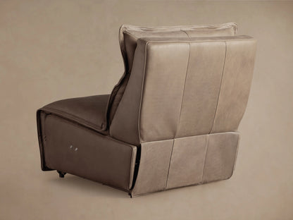 Close-up of Rowland Leather High-Back Armless Motion Recliner's grainy taupe back cushion with detailed stitching.
