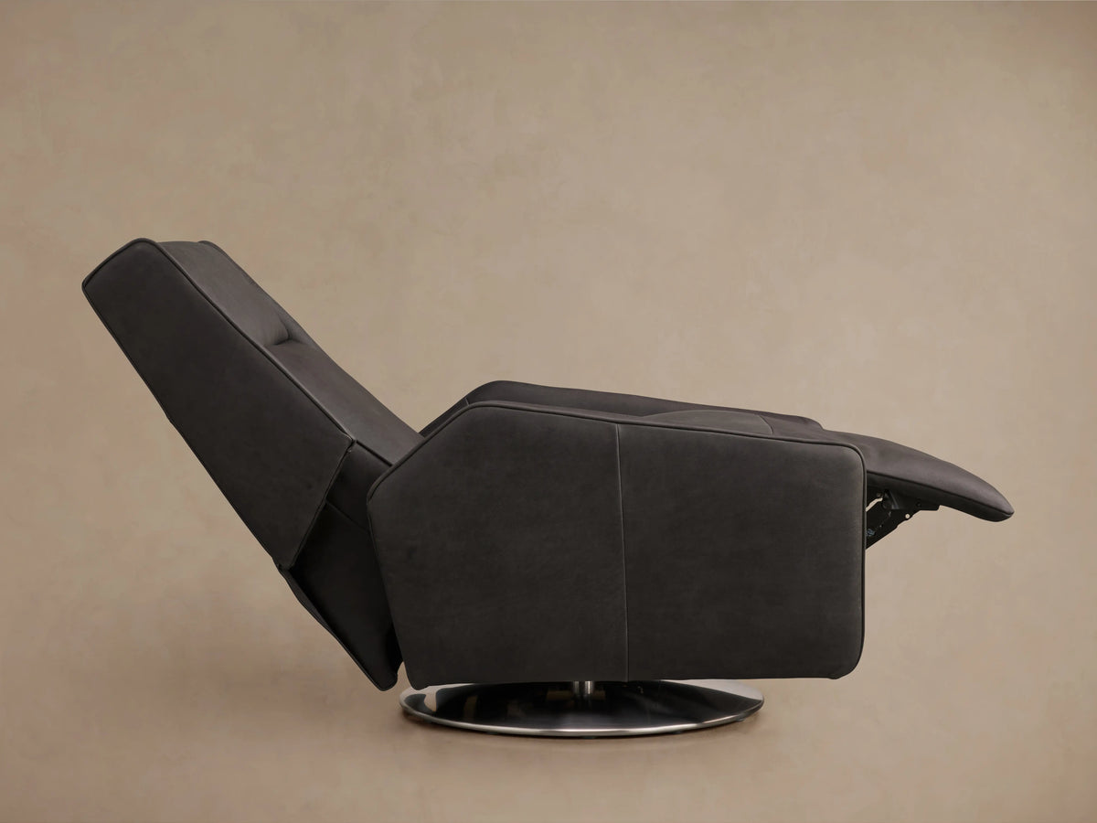 Dark brown Hurley Leather Motion Swivel Chair close-up; smooth leather texture, visible two-button controls on armrest, soft cushion.
