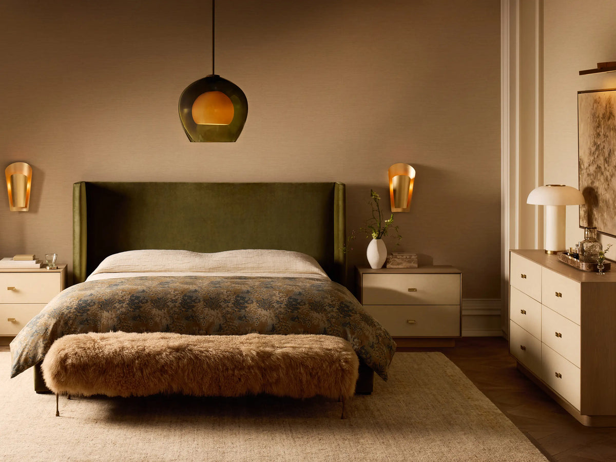 Front view of the Tan Gwen Mongolian Shearling Bench, covered in textured shearling, with four slender hand-painted brass finish legs.