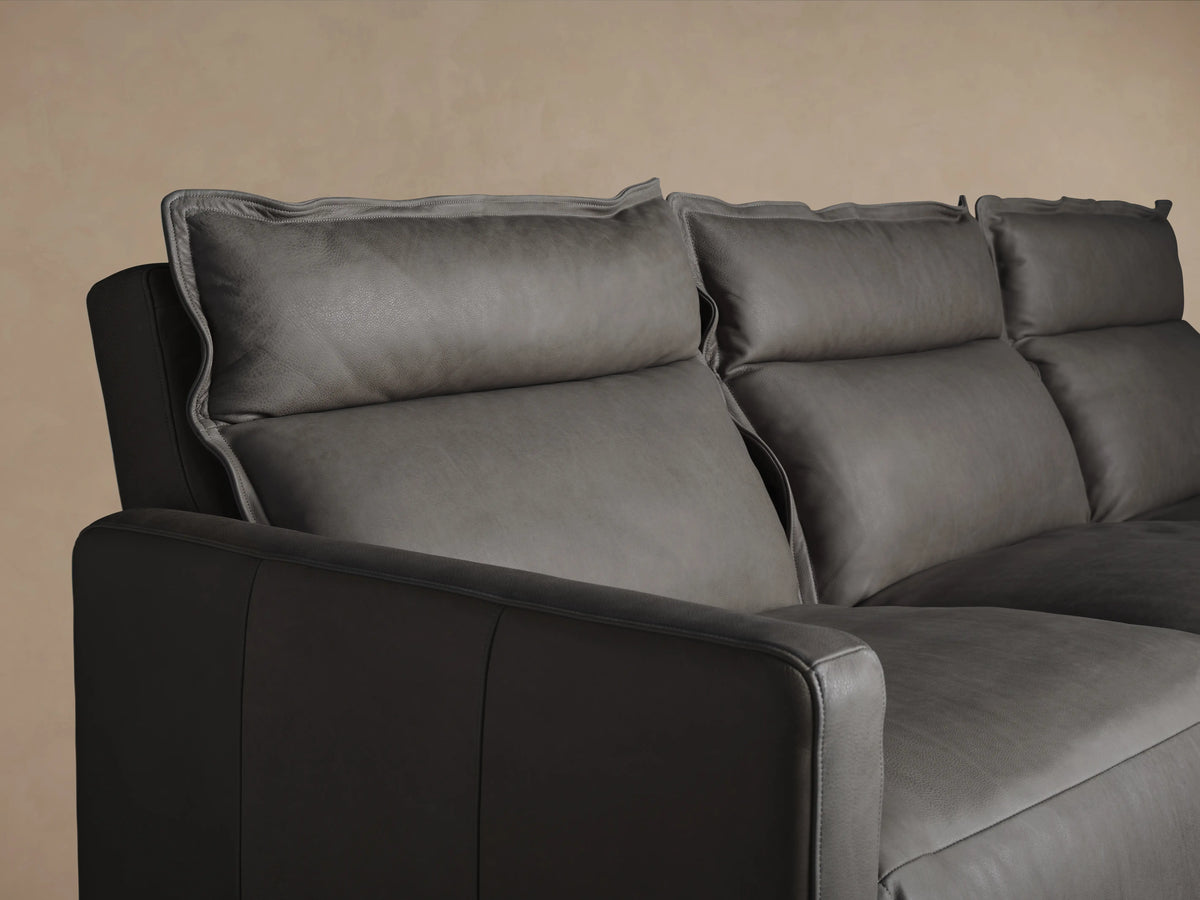 Rowland Leather Three-Piece Motion Modular Sofa in dark brown leather with plush cushions. Left, armless, and right recliner seats shown.