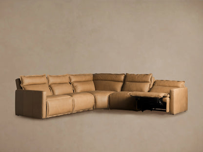 Rowland Leather Five-Piece Motion Corner Sectional in tan leather, viewed from the back, forming an L-shape against a neutral background.