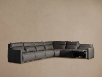 Rowland Leather Six-Piece Motion Sectional in dark leather, showing left arm recliner extended, corner piece, and right arm recliner.