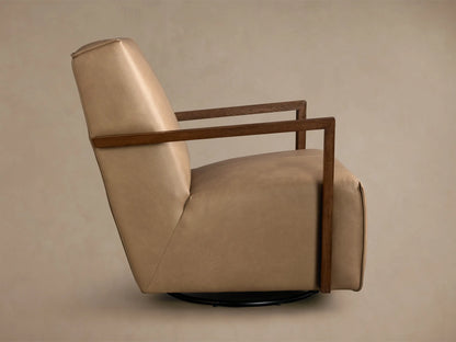 Rear view of the tan Walsh Leather Swivel Glider, featuring stitched leather upholstery, dark wood armrests, and a black swivel base.