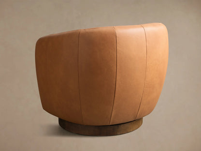 Front view of the tan Cerrito Leather Swivel Chair, featuring a rounded back and seat, with a dark wooden swivel base.