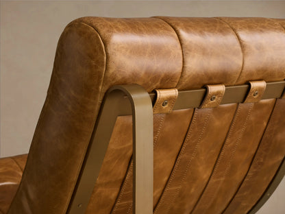 Front view of the tan Callaway Leather Chair with a tufted back and seat, supported by a gold metal frame.