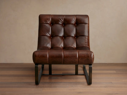 Front-right view of the brown Callaway Leather Chair with a tufted seat and black metal frame in a living room.