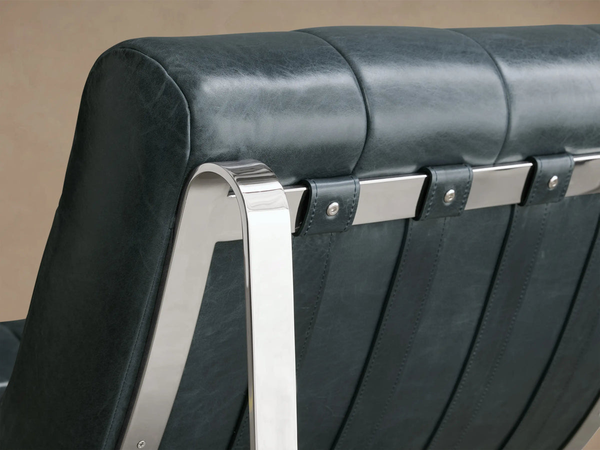 Front view of a Slate Callaway Leather Chair with square tufting, armless design, and polished silver metal legs.