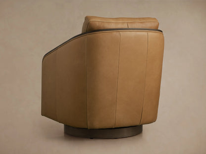 Pomona Leather Swivel Chair with rich tan leather cushions, exposed oak edges on the arms, and a matching backrest pillow.