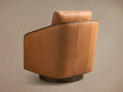 Rear view of a Cognac Pomona Leather Swivel Chair with dark oak arm edges and a circular swivel base.