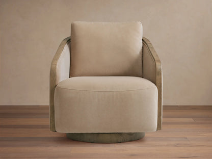 Beige Pomona Swivel Chair with exposed oak edges on the arms and a swivel base, positioned in a well-lit living room.