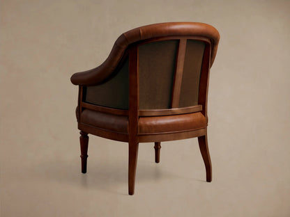Front view of a brown leather Polly Leather Chair with rolled arms and hand-turned dark wood legs.