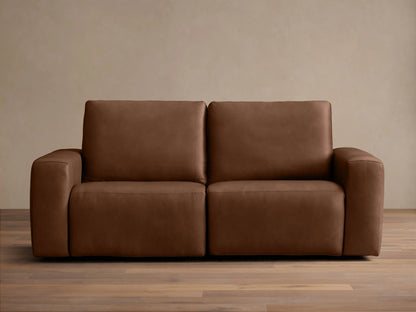 Front view of a brown Brennan Leather Two-Piece Motion Sofa™ with two seats, plush back and seat cushions, and wide block arms.