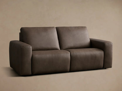 Front view of the dark brown Brennan Leather Two-Piece Motion Sofa, showing two plush seat cushions and wide armrests.