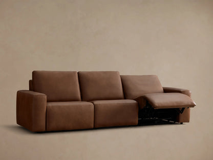 Front view of the brown Brennan Leather Three-Piece Motion Sofa with the left and right recliners' footrests extended.