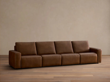 Front view of the brown Brennan Leather Four-Piece Motion Sectional with four plush sections.