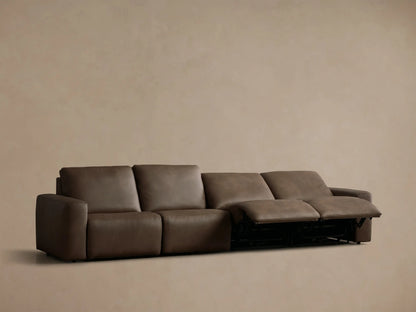 Rear view of the brown Brennan Leather Four-Piece Motion Sectional, showing four individual backrest sections.