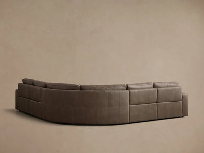 Front view of the brown Brennan Leather Five-Piece Motion Corner Sectional, with two reclined footrests extended.