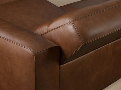 Back view of a Borough Leather Two-Piece Motion Sofa in rich brown leather, showing two distinct reclining sections.