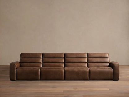 Borough Leather Four-Piece Motion Sectional, front view, rich brown leather, against a light beige wall on a wood floor.