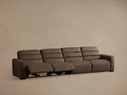 Borough Leather Four-Piece Motion Sectional, brown, with two right seats reclined, footrests extended.