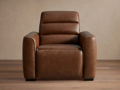 Borough Leather Motion Recliner, rich brown leather, padded back, wide arms, subtle piping, angled right.