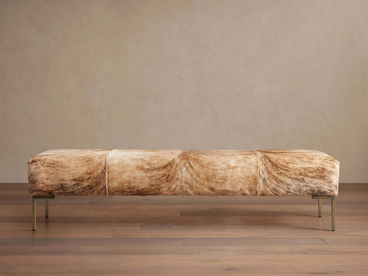 Tilton Hair on Hide Bench with natural tan and brown color variations, featuring metal legs, set against a neutral background.