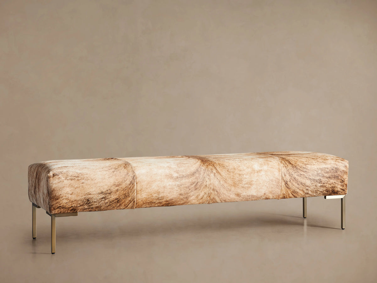 Tilton Hair on Hide Bench with natural tan and brown color variations, featuring metal legs, set against a neutral background.