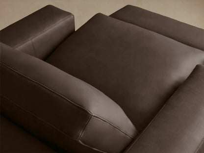 Kipton Wide Arm Leather Motion Recliner in brown leather, showing a close-up of the wide arm with a silver two-button control panel embedded.