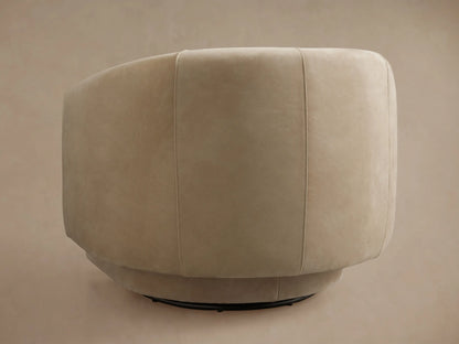 Hamlin Nubuck Leather Swivel Chair in beige, side view. Features a plush, curved backrest and seat with a 360-degree swivel base.