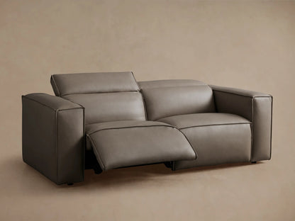 Coburn Leather Two-Piece Motion Sofa shown from the back, featuring two recliner sections with a smooth gray leather finish, detailed stitching, and padded backrests.