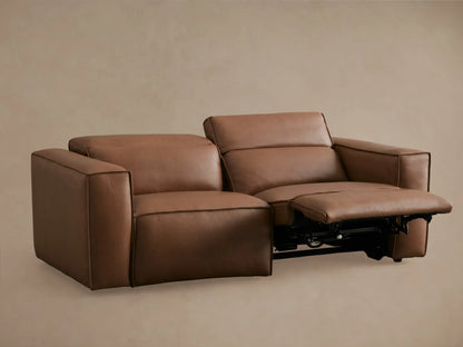 Alt text: Coburn Leather Two-Piece Motion Sofa in brown leather with one seat reclined and footrest extended on the left.