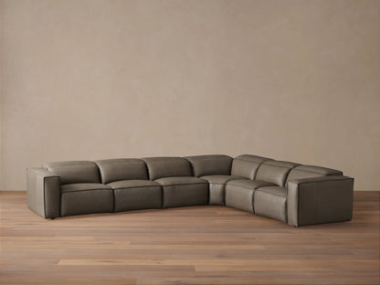 Coburn Leather Six Piece Motion Sectional in dark brown leather with clean lines. Long horizontal layout, left and right arm recliners, armless sections, and a corner piece on wood floor.