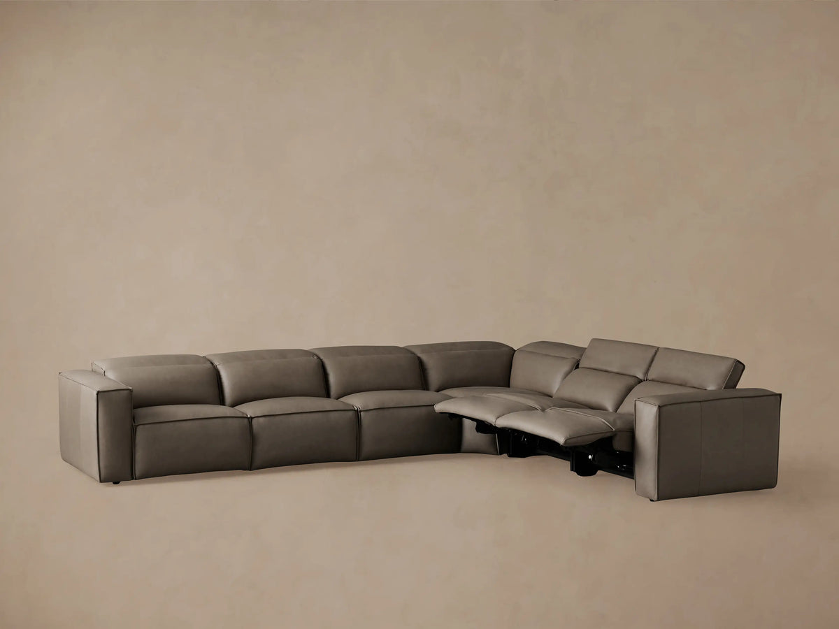 Coburn Leather Six Piece Motion Sectional in grey leather, L-shaped configuration. High backrests, minimalist design, right angle view.