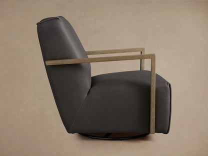 Walsh Leather Glider with sleek, dark brown leather upholstery and modern wooden armrests on a neutral background.
