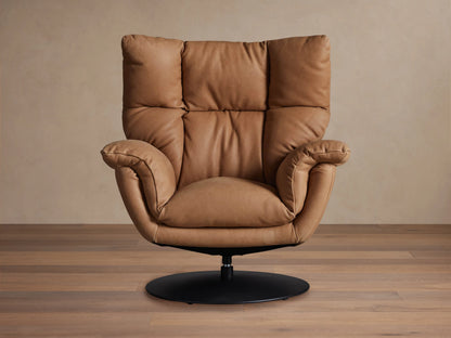 Tan Deacon Leather Swivel Recliner, front-angled, plush cushions, rolled arms, and a black circular swivel base on wood floor.