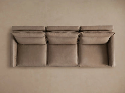 Rowland Leather Three-Piece Motion Modular Sofa shown with gray leather finish, three seats, reclined positions, and footrests extended.