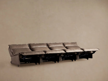 Rowland Leather Four-Piece Armless Motion Modular Sofa shown from the back, featuring four armless reclining sections in a taupe leather finish.
