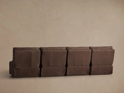 Close-up of rich, dark brown leather Rowland Armless Modular Sofa seat, backrest & two control buttons. Angled view.