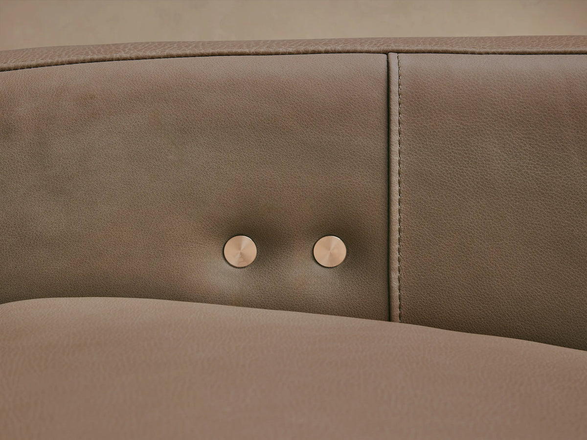 Rowland Tailored Leather Six-Piece Motion Sectional, L-shaped, taupe leather, with modular reclining seats on a wood floor.