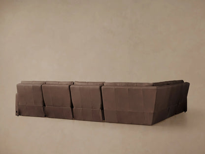 Close-up of Rowland Tailored Leather Six-Piece Motion Sectional, showing rich brown leather seat and back cushions.