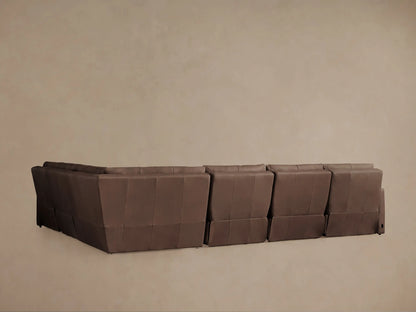 Close-up of Rowland Tailored Leather Sectional, rich brown leather on seat and soft, contoured back cushions, angled view.