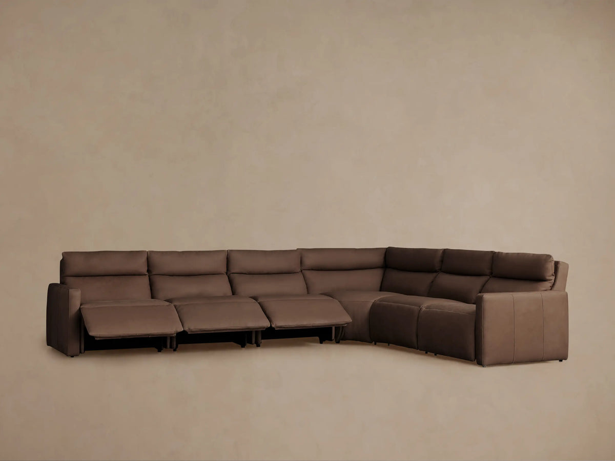 L-shaped Rowland Tailored Leather Six-Piece Motion Sectional in taupe brown, with several recliners partially open.