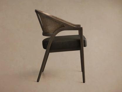 Front view of the Aimee Faux Leather Dining Arm Chair with a Black Drifted oak frame, natural rattan back, and dark faux leather seat.