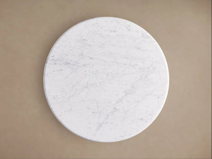 Amelia Bistro Table with white Carrara marble top & light oak wood-grain base, viewed from above at an angle.