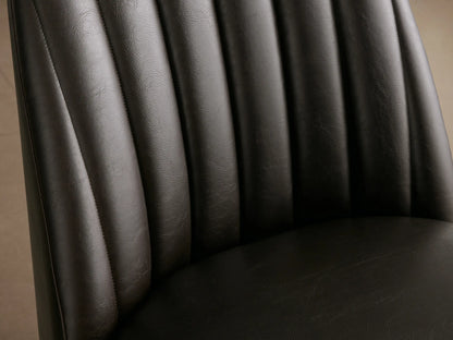 Arco Faux Leather Dining Chair in dark brown, with a channel-tufted backrest, padded seat, and tapered wooden legs.