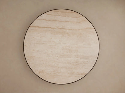 Astor Round Dining Table close-up. Light beige natural marble top with veining, dark oak wood rim, and reeded base.