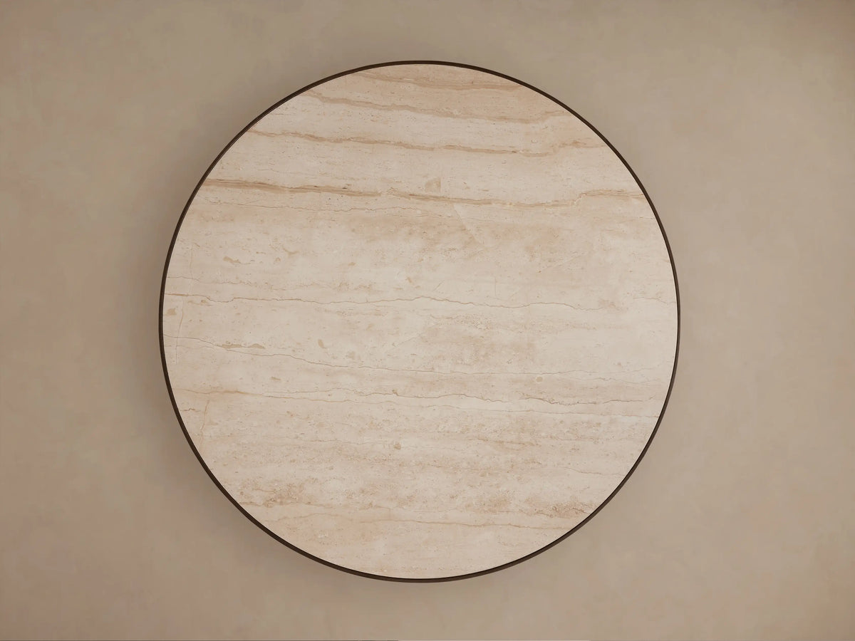 Astor Round Dining Table: Close-up of light beige marble top with subtle veining and dark reeded oak wood base.