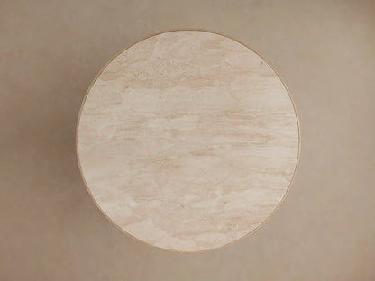 Astor Round Dining Table: close-up of light beige natural marble top with subtle veining and reeded oak wood base.