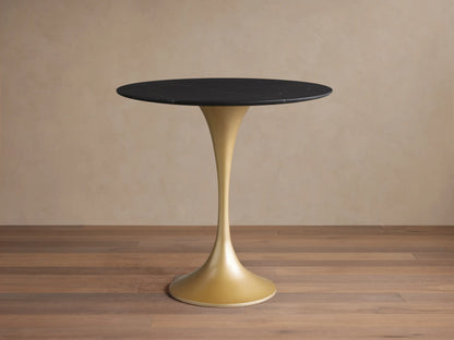 Round black marquina marble tabletop of the Saint Germain Bistro Table, featuring white veining, viewed from above.